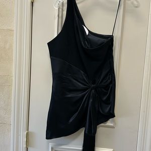 Satin black one shoulder , rushed in the waistband . Top